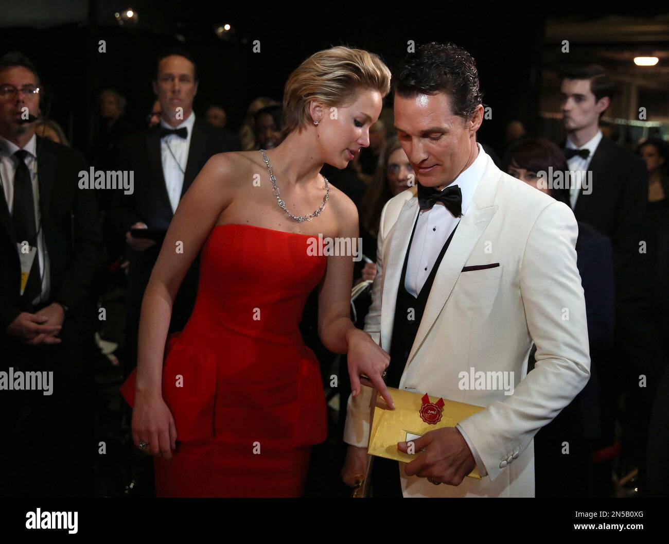 Jennifer Lawrence, left, and Matthew McConaughey appear backstage