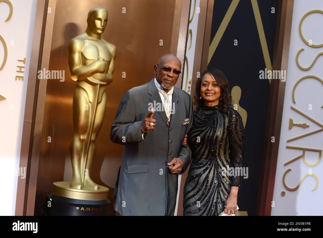 Louis Gossett, Jr., left, and Cyndi James Gossett arrive at the Oscars