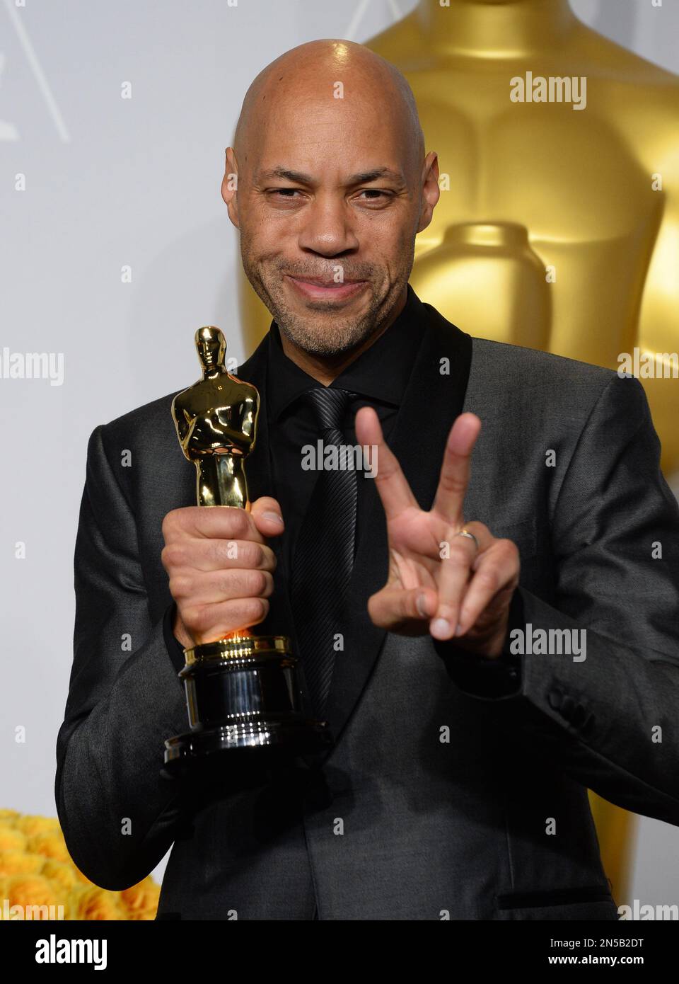 John Ridley John Ridley poses in the press room with the award for best adapted ...