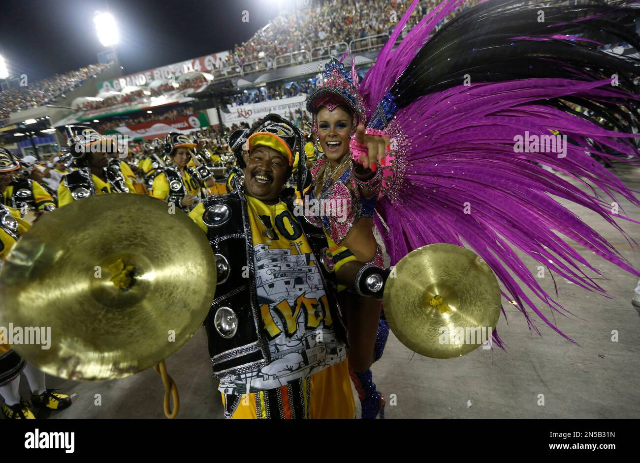 Performers from the Sao Clemente samba school pose during carnival