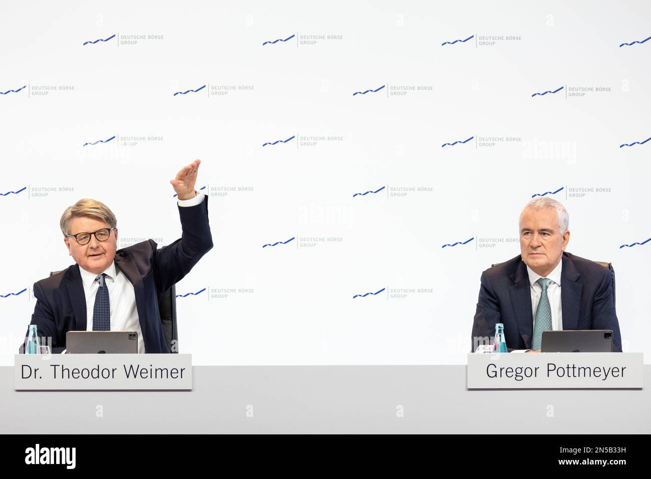 09 February 2023, Hesse, Frankfurt/Main: Theodor Weimer, CEO of Deutsche Börse AG (l), and Gregor Pottmeyer, Executive Board member of Deutsche Börse AG (r), speak at the press conference. Deutsche Börse Group presents the figures for the financial year 2022 at the annual press conference. Photo: Hannes P. Albert/dpa Stock Photo