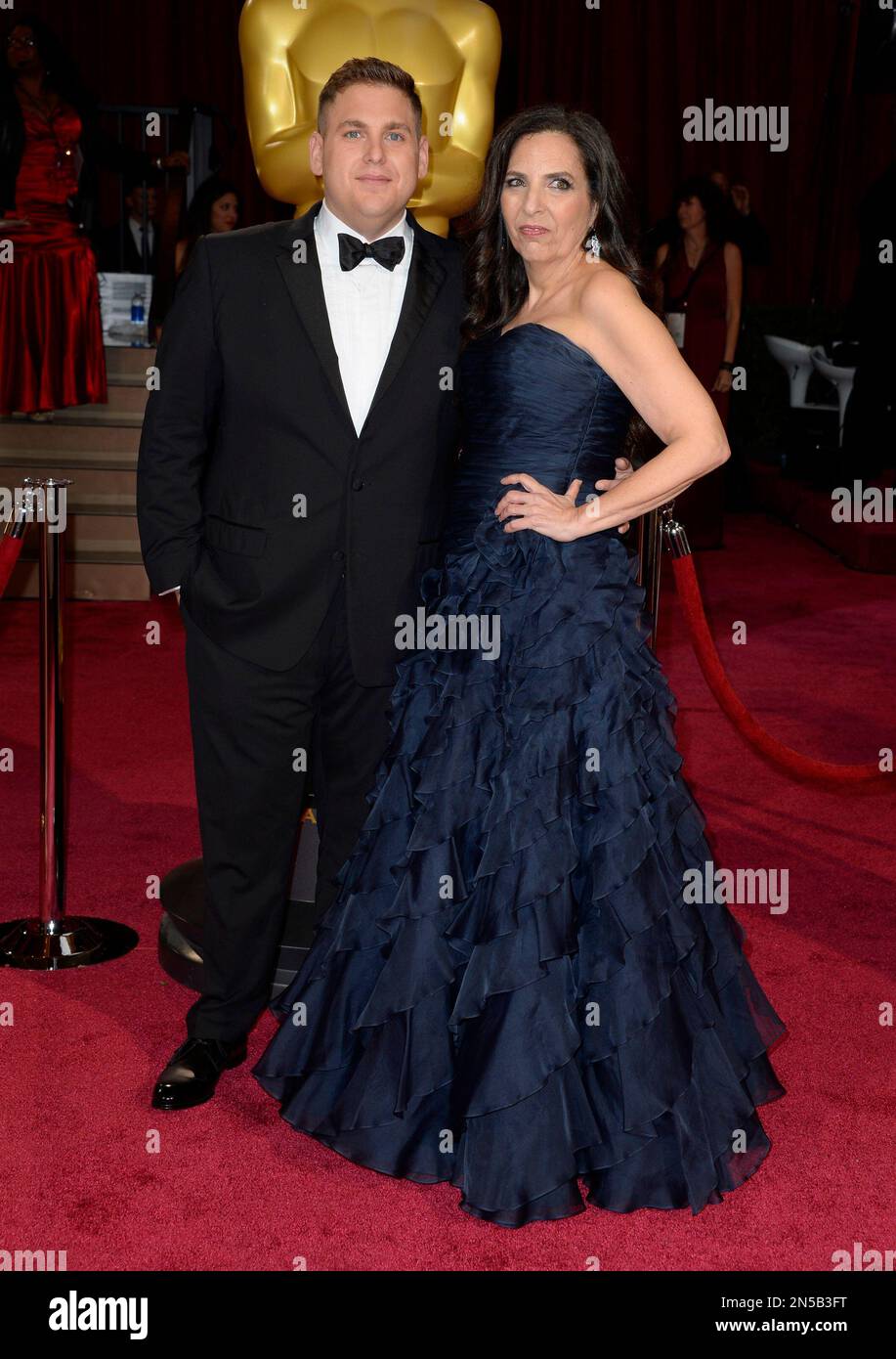 Jonah Hill, left, and Sharon Lyn Chalkin arrive at the Oscars on Sunday