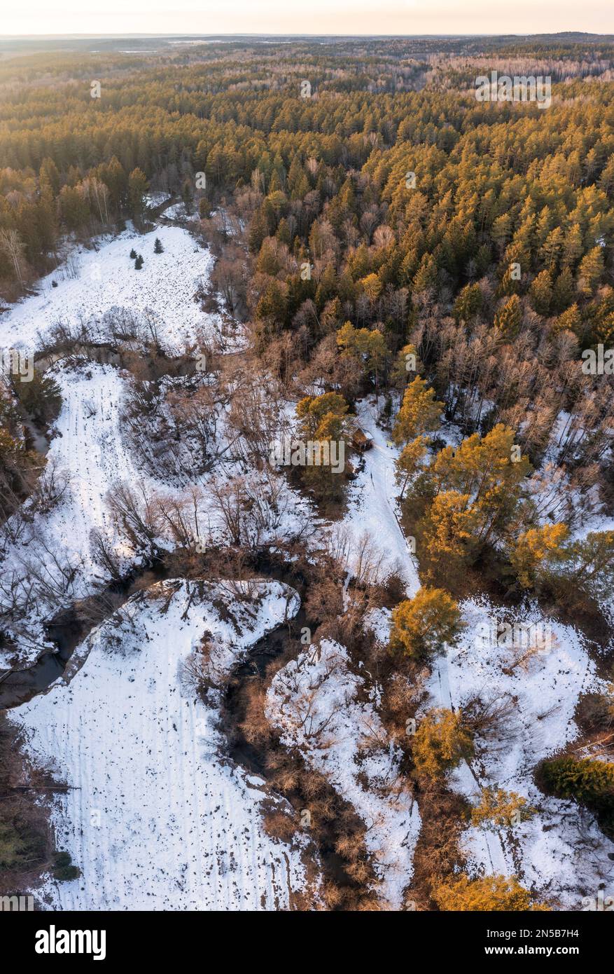 River through woods in snowfall hi-res stock photography and images - Alamy