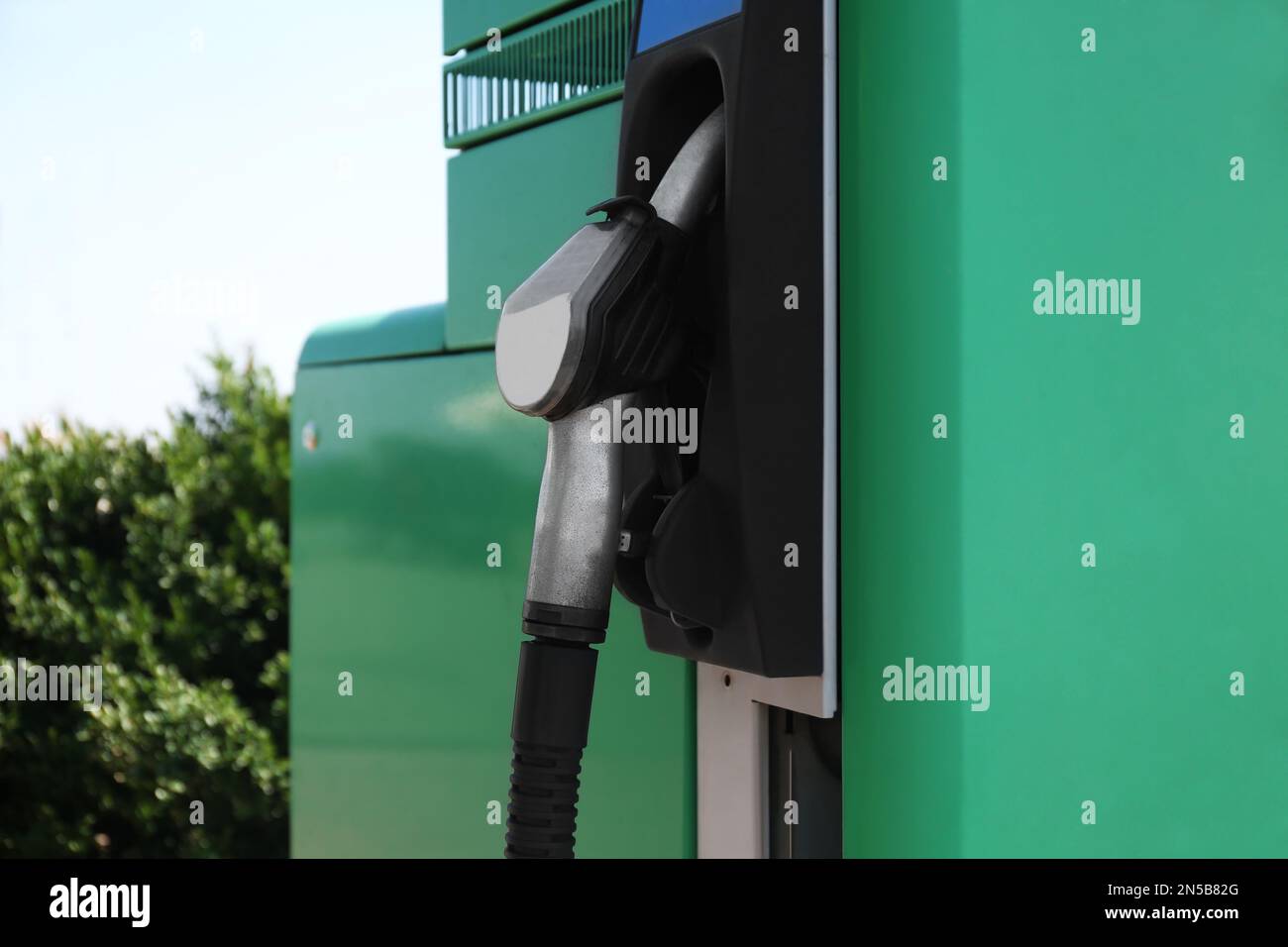 Green color fuel pump gun hi-res stock photography and images - Alamy