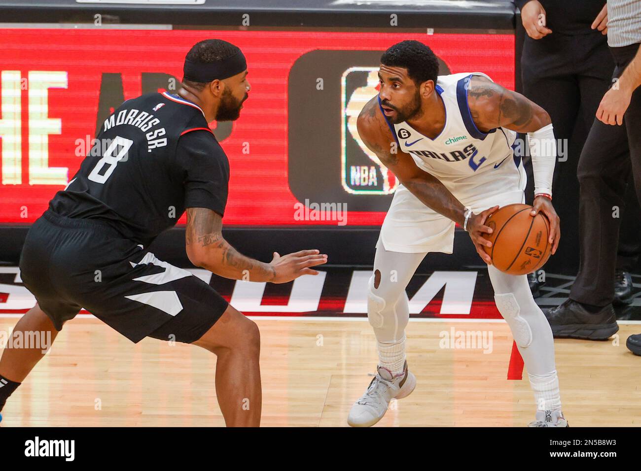 Los Angeles, United States. 08th Feb, 2023. Marcus Morris Sr. (L) of Los  Angeles Clippers and Kyrie Irving (R) of Mavericks Dallas in action during  the NBA basketball game between Clippers and