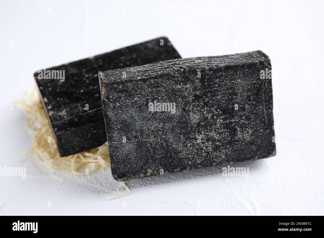 Black color natural soap hi-res stock photography and images - Alamy