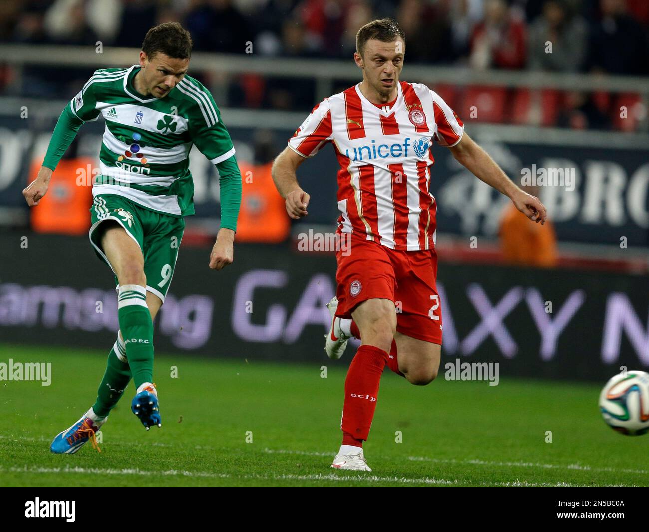 Panathinaikos' Marcus Berg, left, scores his team's second goal as