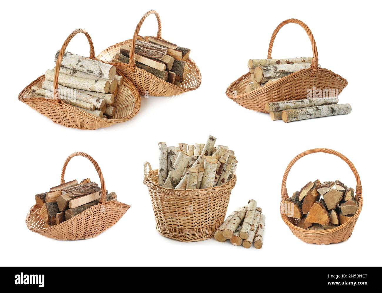 Set of cut firewood in wicker baskets on white background Stock Photo
