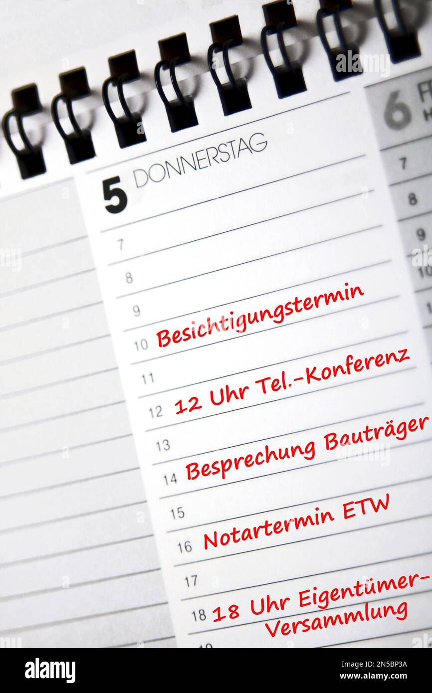 desk calendar in German with several entries Stock Photo - Alamy