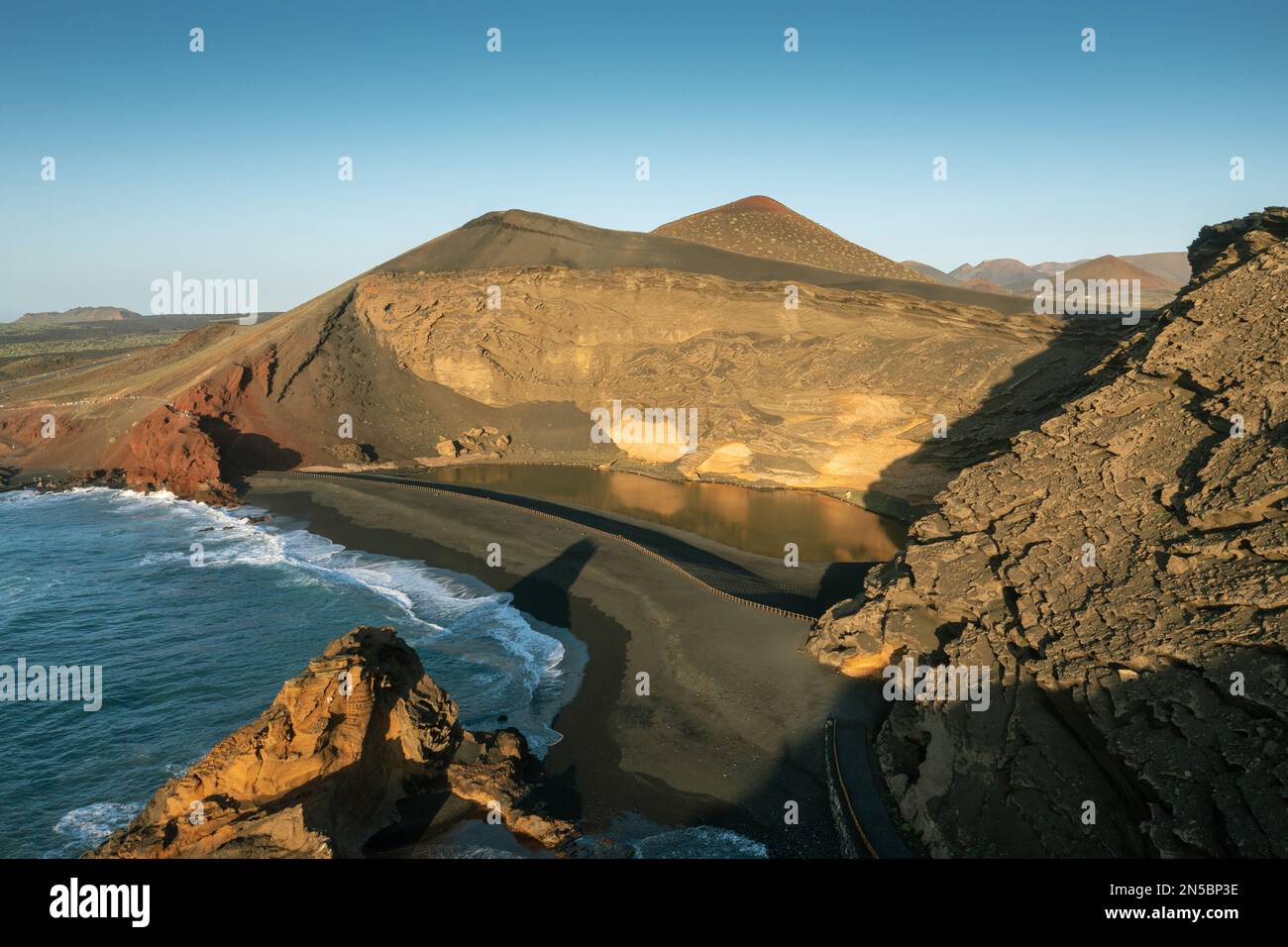EL Golfo lagoon in a tuff crater by the sea, aerial photo, Canary Islands, Lanzarote, Yaiza Stock Photo