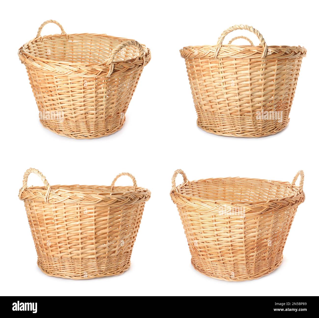 Set with empty wicker baskets on white background Stock Photo Alamy