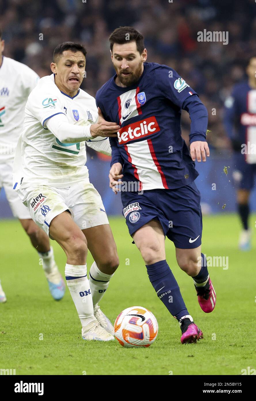 February 8, 2023, Rome, France: Lionel Messi of PSG, Alexis Sanchez of  Marseille (left) during the French Cup round of 16 football match between  Olympique de Marseille (OM) and Paris Saint-Germain (PSG)