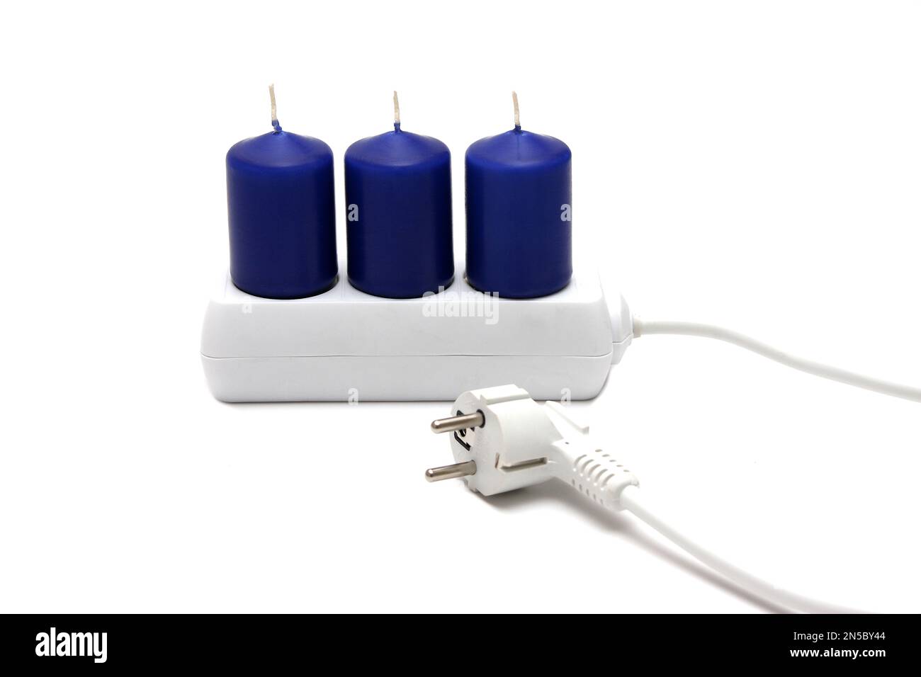 power socket with candles, saving energy Stock Photo Alamy