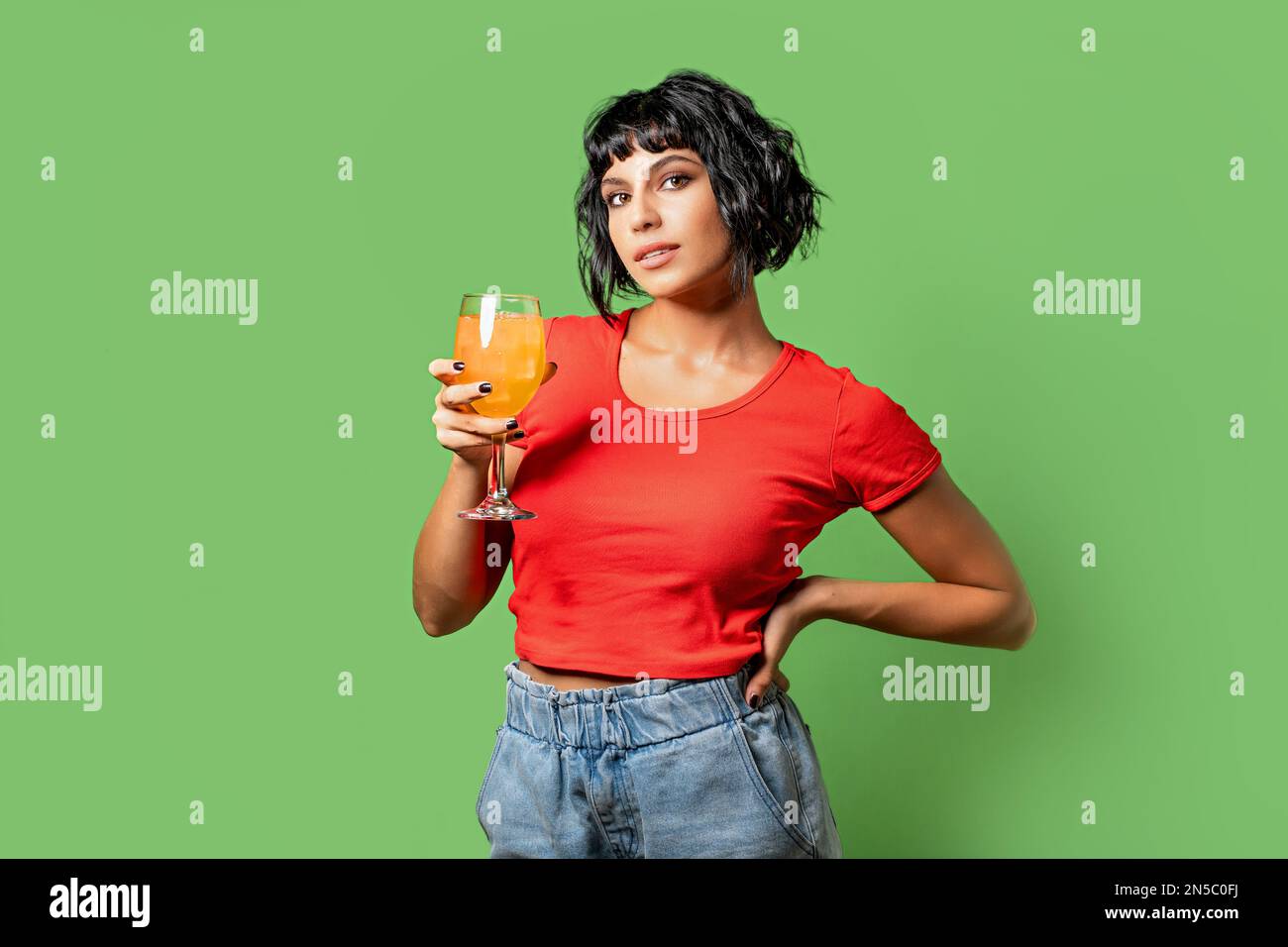 Woman wearing orange shirt hi-res stock photography and images - Alamy