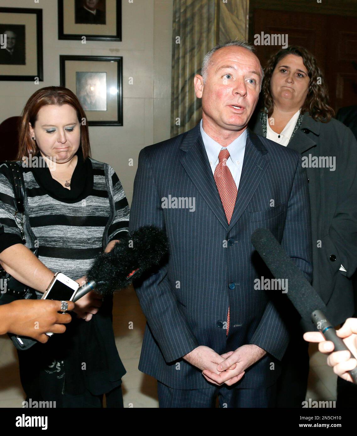 Attorney David Slane talks with the media following an Oklahoma Supreme ...