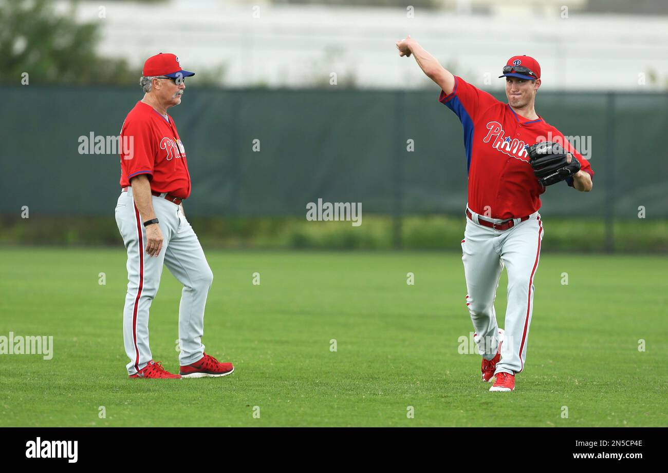 Philadelphia Phillies pitching coach Bob McClure, left, watches pitcher