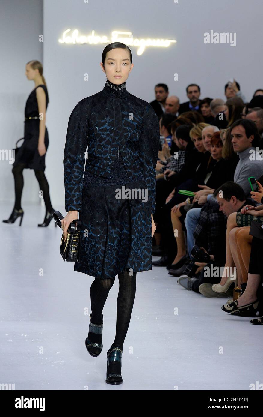 A model wears a creation for Salvatore Ferragamo women s Fall Winter 2014 15 collection part of the Milan Fashion Week unveiled in Milan Italy Sunday Feb. 23 2014. AP Photo Giuseppe Aresu Stock Photo ...