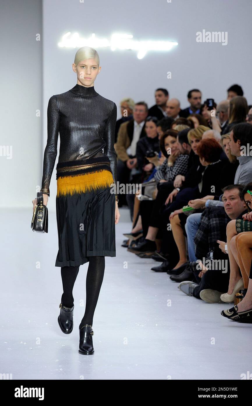 A model wears a creation for Salvatore Ferragamo women s Fall Winter 2014 15 collection part of the Milan Fashion Week unveiled in Milan Italy Sunday Feb. 23 2014. AP Photo Giuseppe Aresu Stock Photo ...