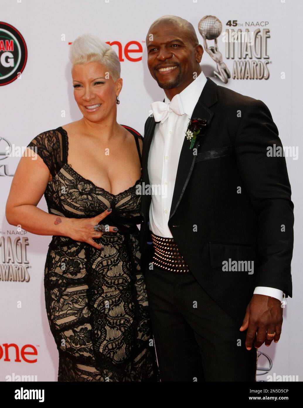 Rebecca King-Crews, left, and Terry Crews arrive at the 45th NAACP