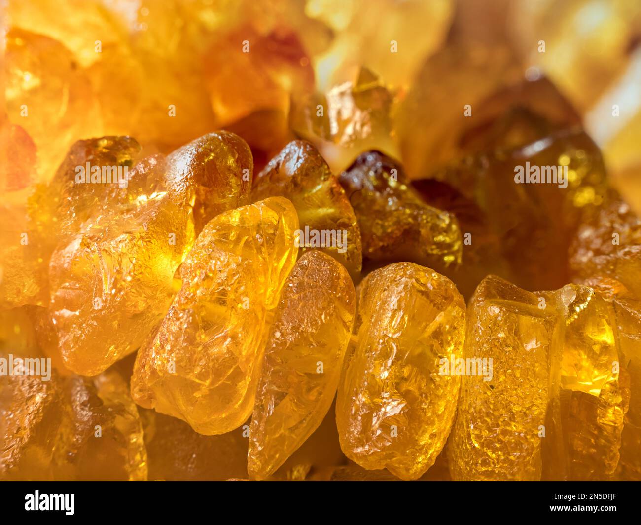 Extreme closeup of amber necklace stones Stock Photo