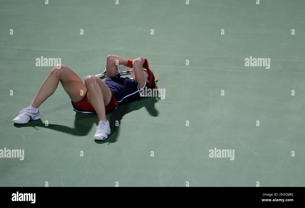 Alize of France celebrates after she beats Serena Williams of