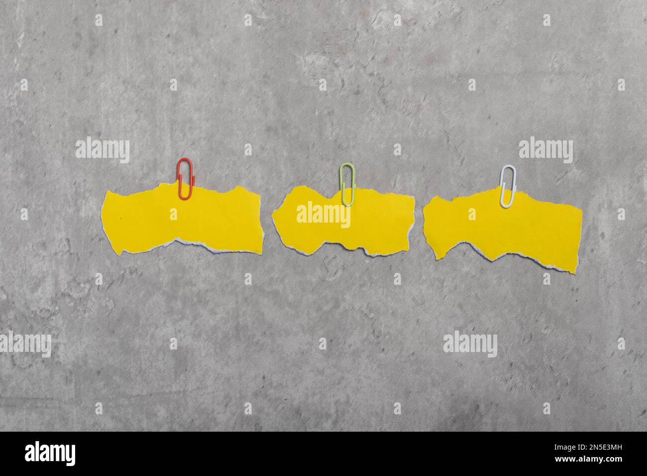 Yellow torn paper for inserting text.Copy space Stock Photo - Alamy