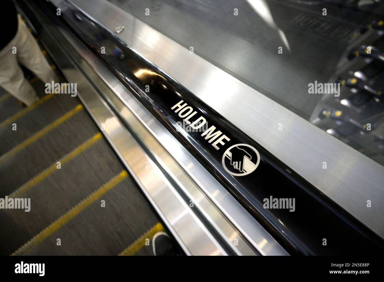 London, England, UK. Escalator handrail in London Bridge station '"Hold