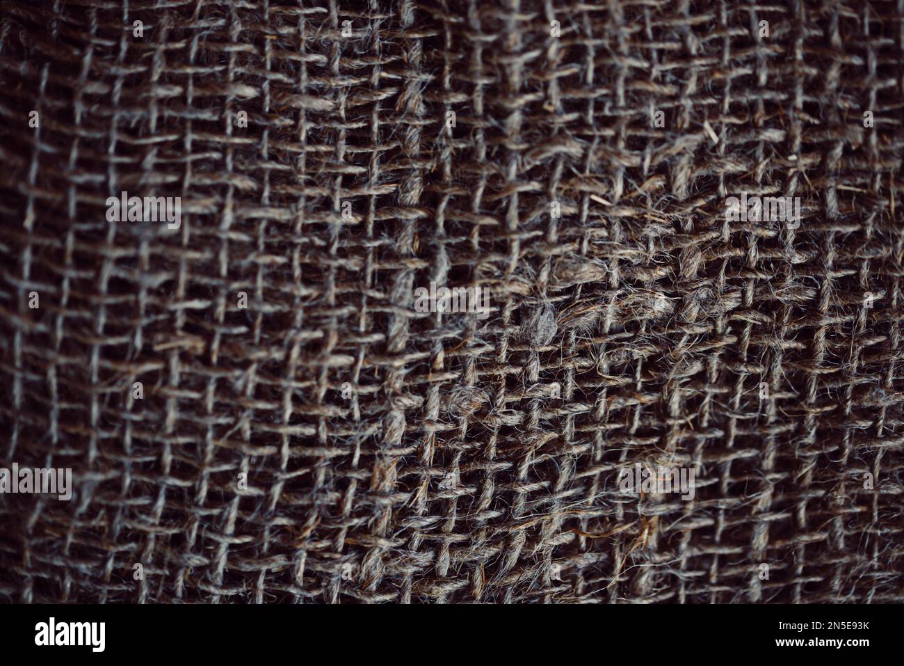 Texture of burlap fabric in sunlight. Stock Photo