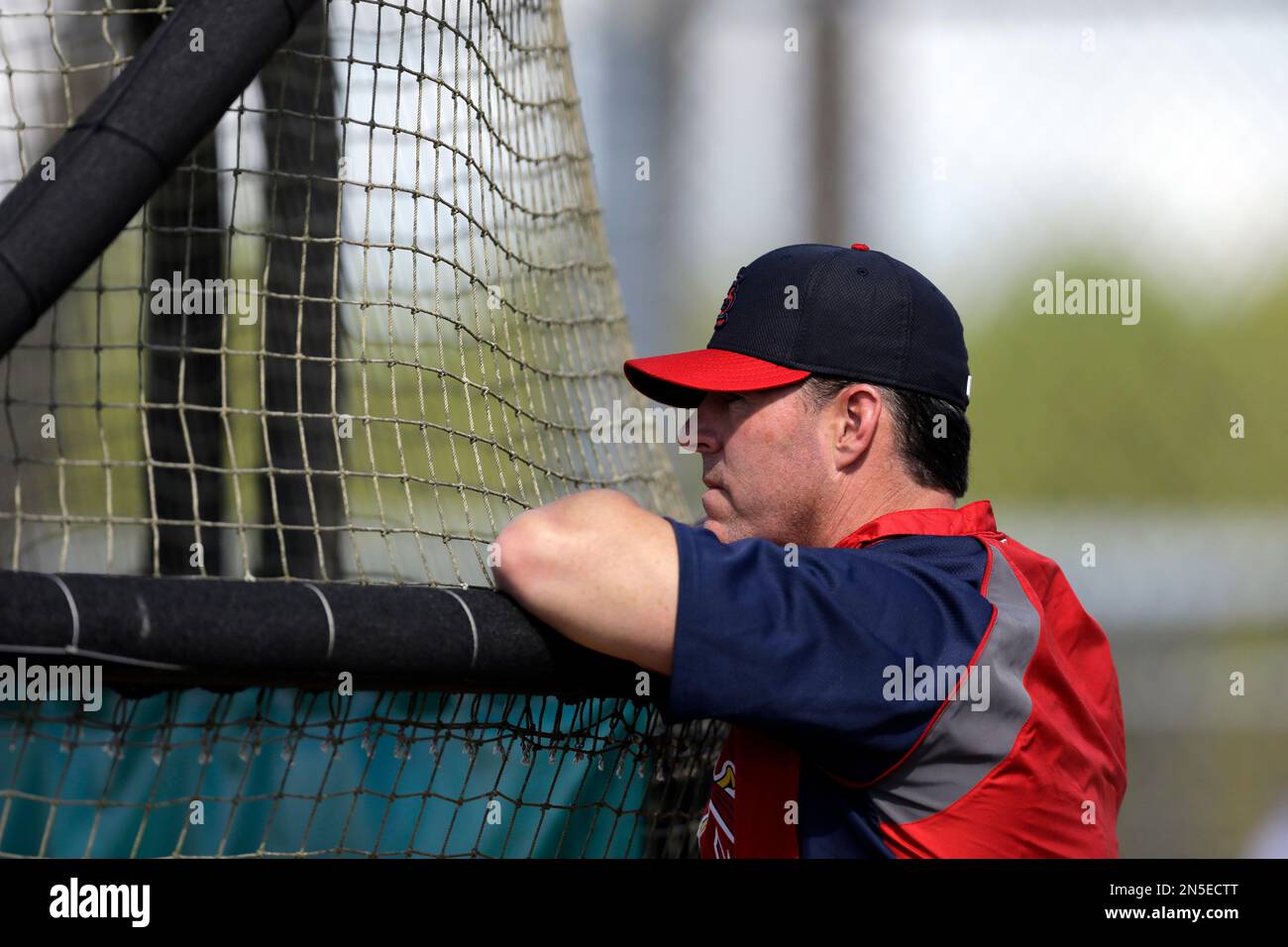 Former St. Louis Cardinals' Jim Edmonds leans agains a batting cage as