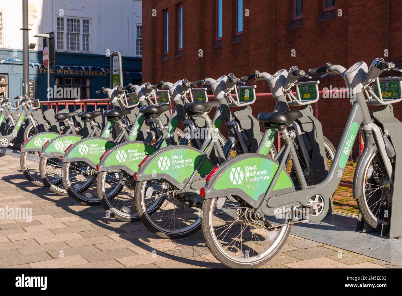West Midlands Cycle Hire - row of public bicycles to rent on a rack in Wolverhampton Stock Photo