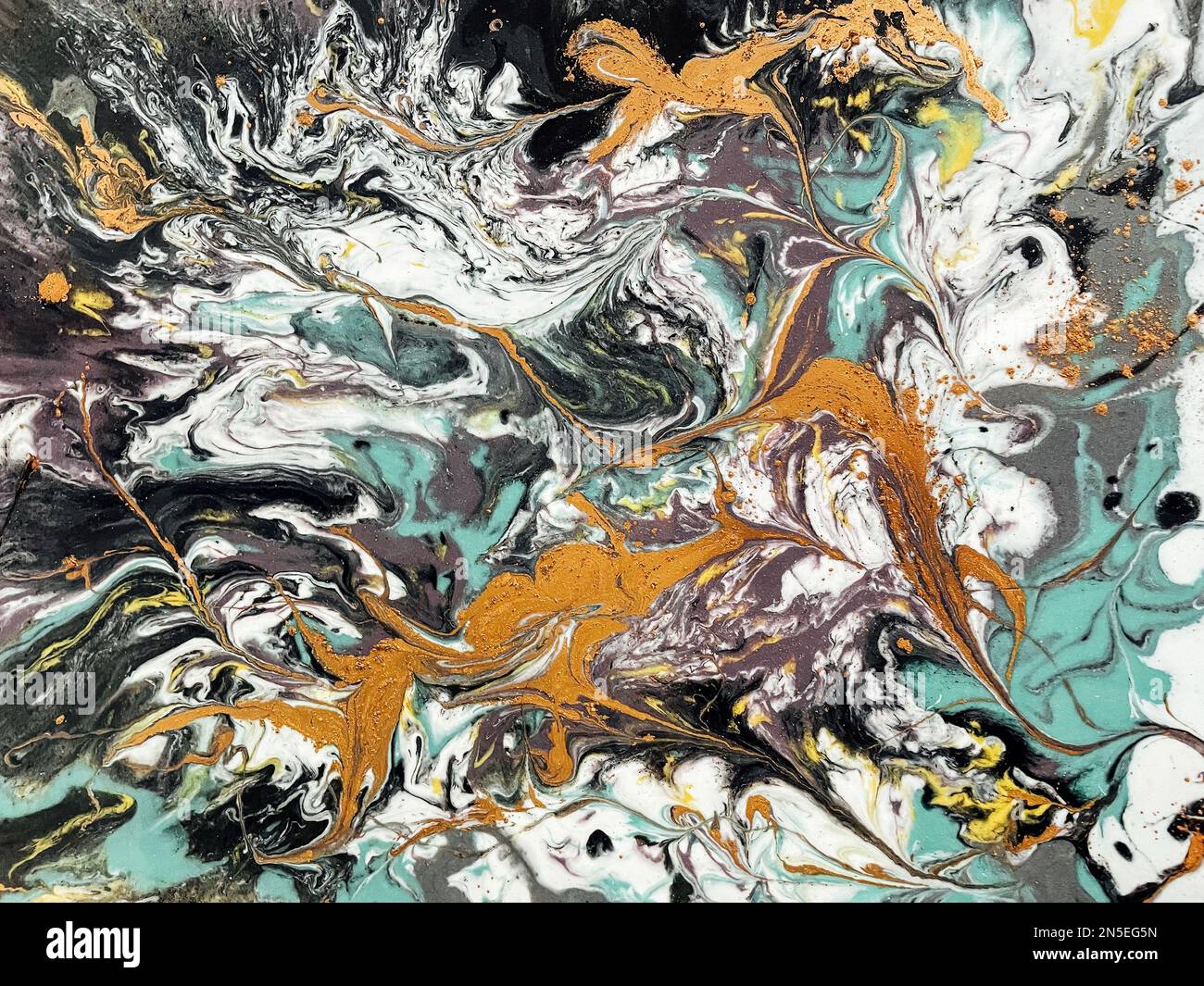 Abstract painting is made in the technique of painting with liquid