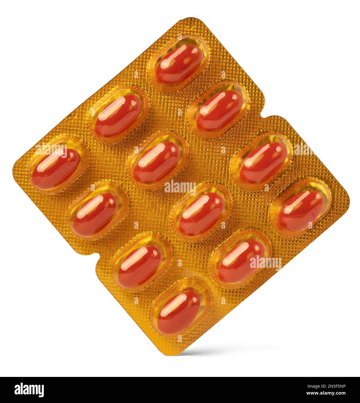 template of soft red gelatin capsules in blister pack, vitamin pills