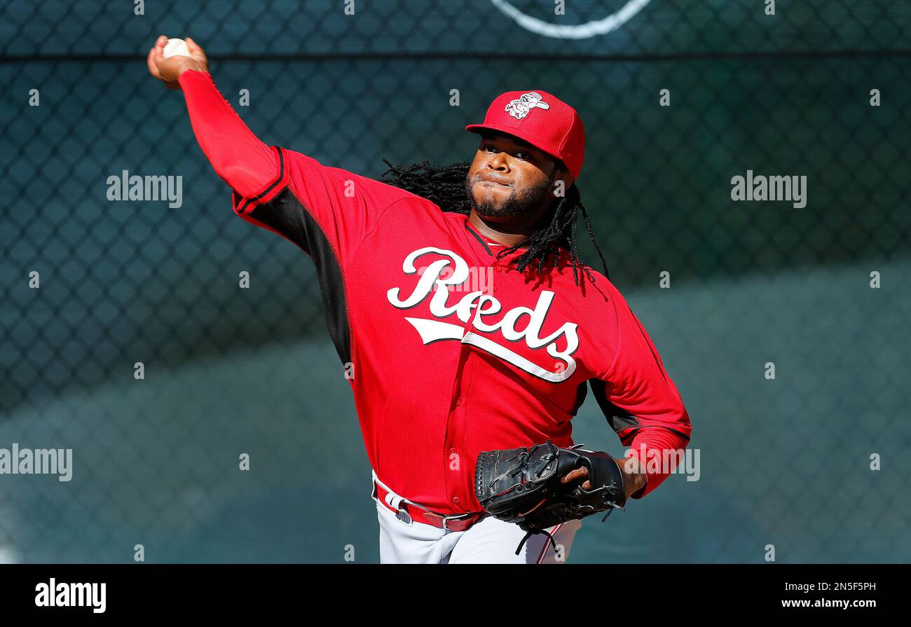 Cincinnati Reds pitcher Johnny Cueto throws during spring training
