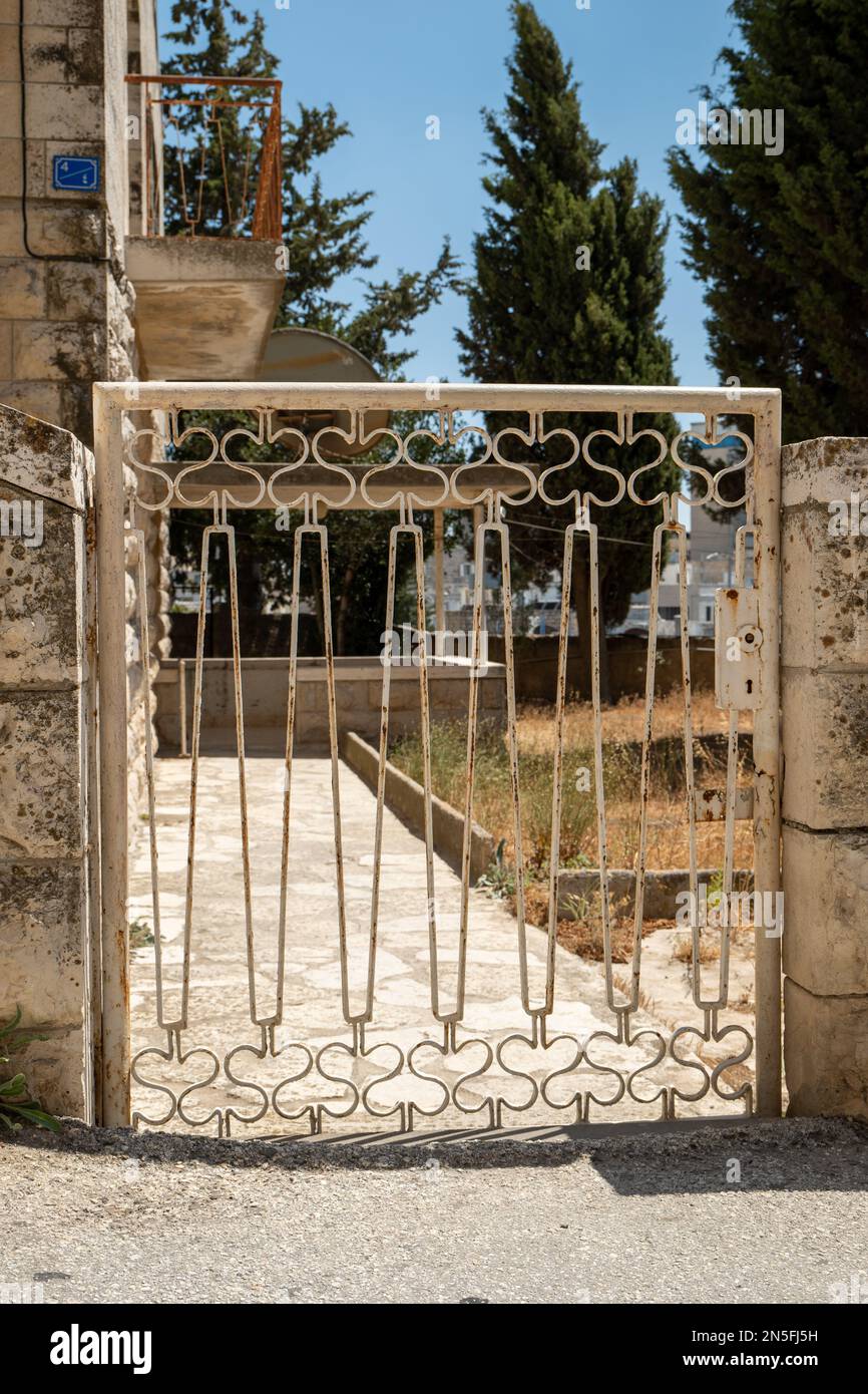 Bethlehem, West Bank, Palestine 22 July 2022 White Gate Door to A