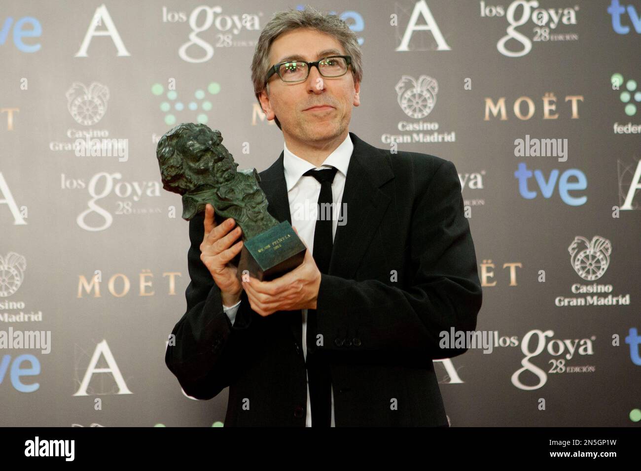 Spanish director David Trueba holds his Goya trophy after winning the ...