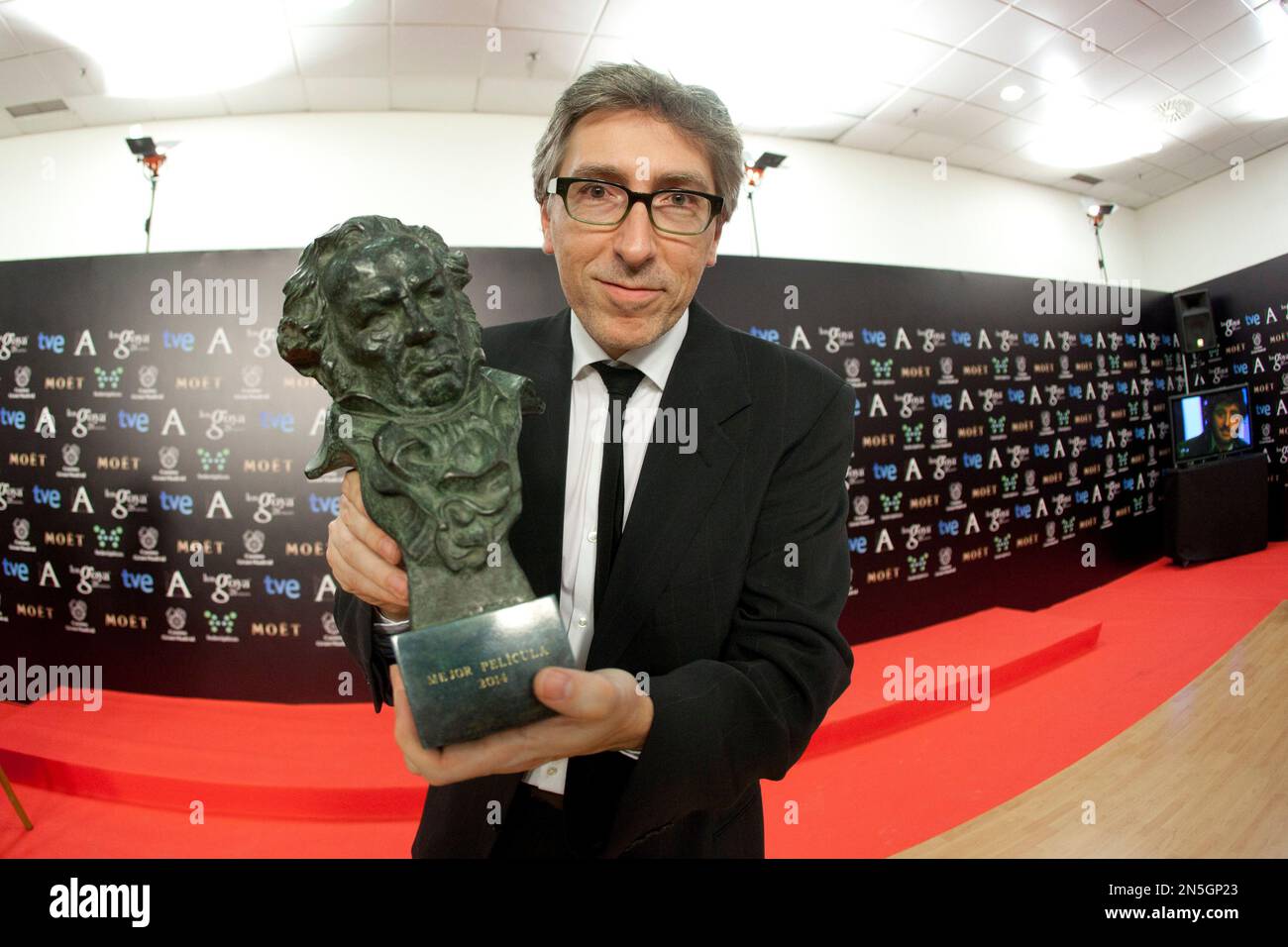 Spanish director David Trueba holds his Goya trophy after winning the ...