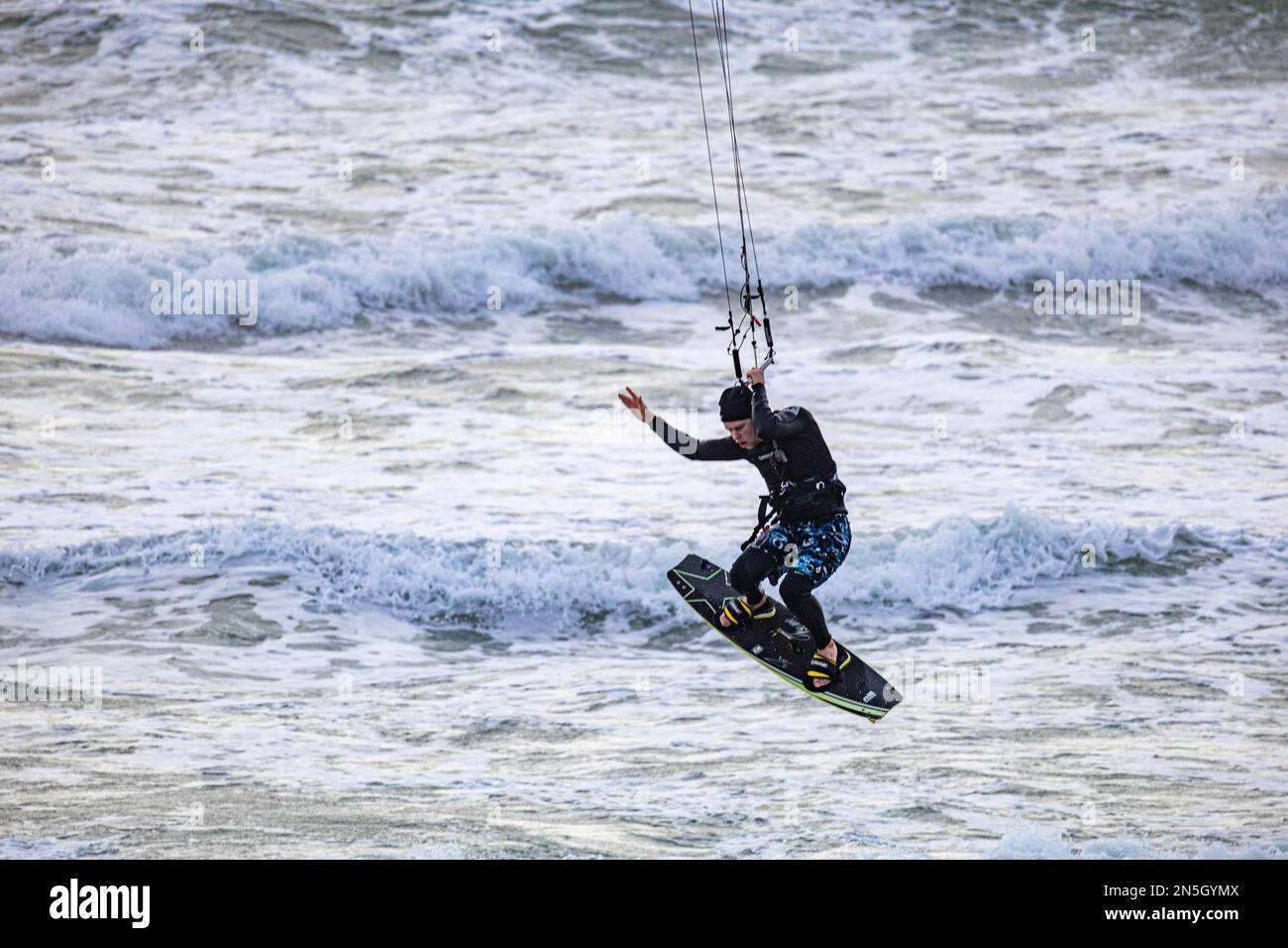 Mounts Bay Kite Surfer wave jumping in a gale Stock Photo Alamy