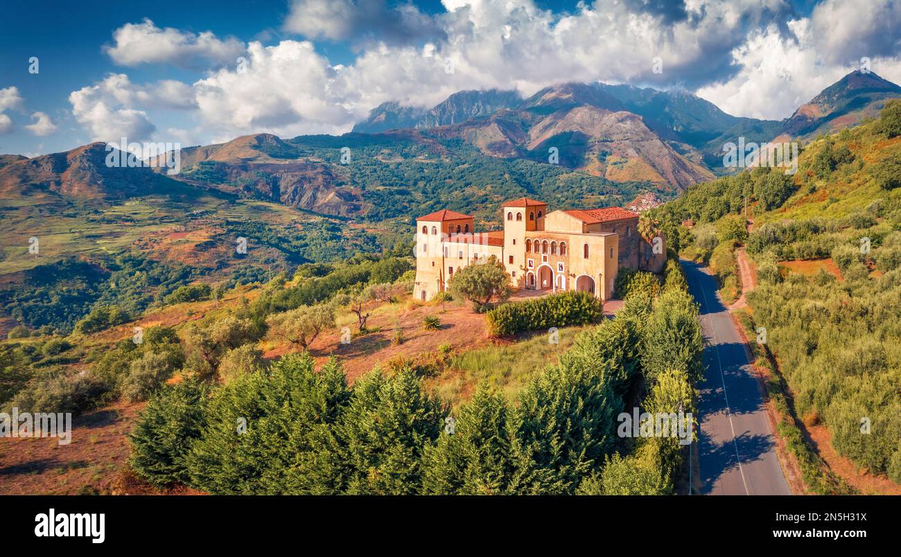 Amazing view from flying drone of typical Italian church, Bonifati village location, Province of Cosenza. Picturesque summer scene of mountains in Ita Stock Photo