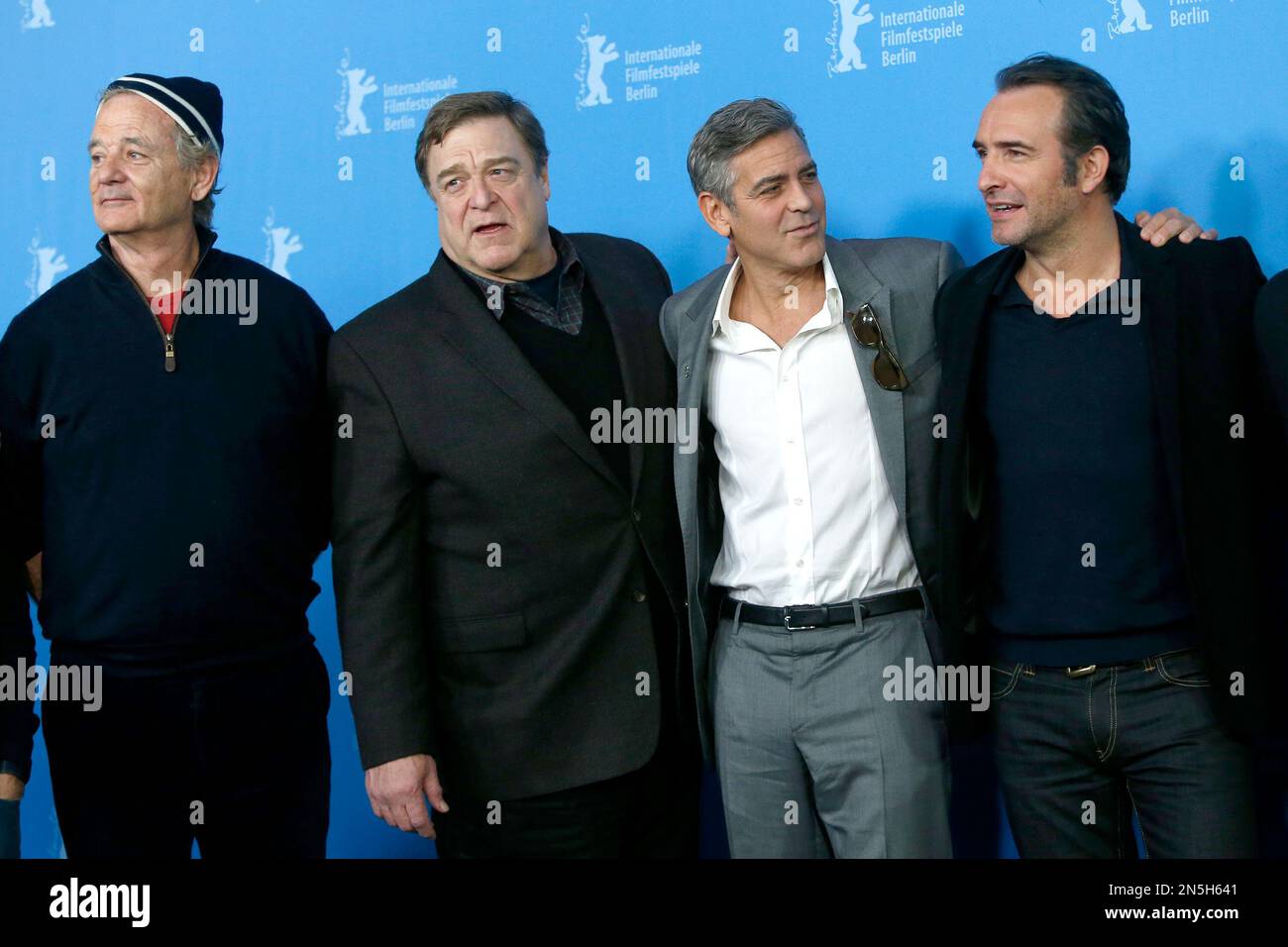 From left, actors Bill Murray, John Goodman, George Clooney and Jean  Dujardin pose for photographers at the photo call for the film The  Monuments Men during the 64th Berlinale International Film Festival