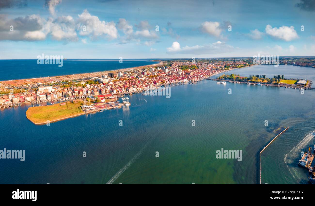 View from flying drone of Sottomarina town. Stunning summer seascape of Adriatic sea. Aerial morning scene of Italy, Europe. Traveling concept backgro Stock Photo