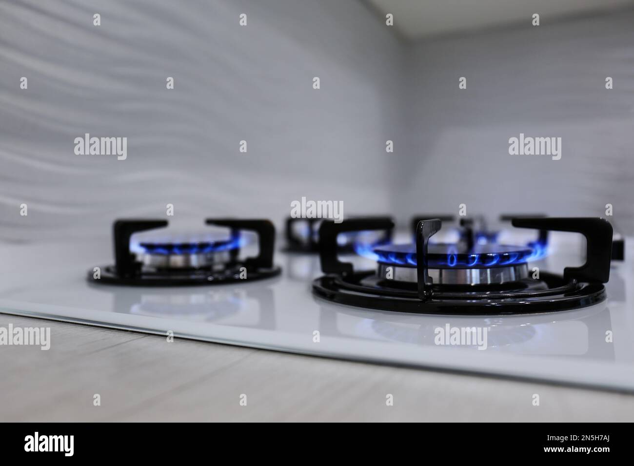 Modern kitchen stove with burning gas indoors Stock Photo Alamy