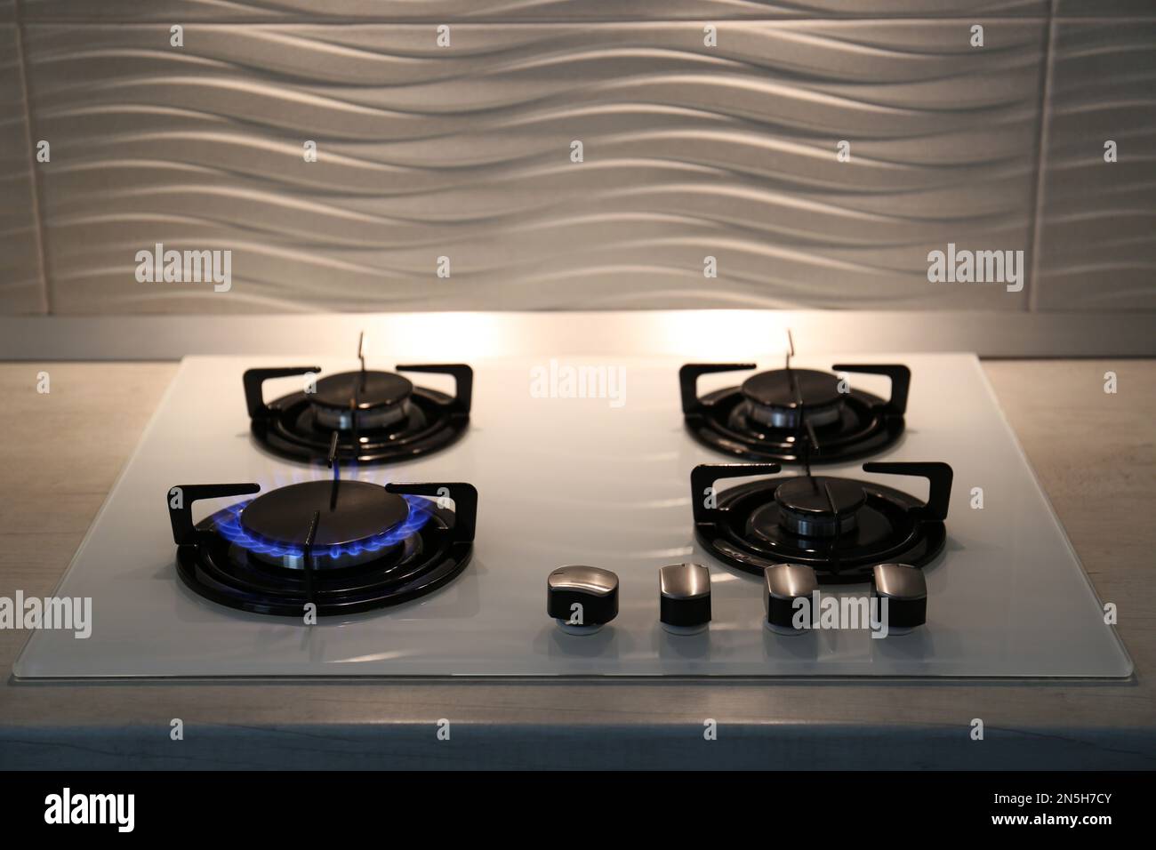 Modern kitchen stove with burning gas indoors Stock Photo Alamy