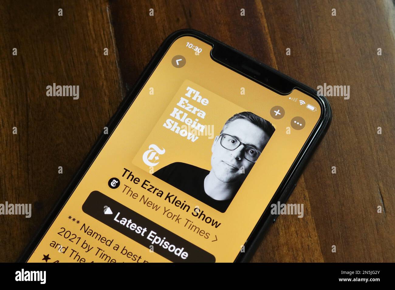 The Ezra Klein Show podcast displayed on a phone screen Stock Photo - Alamy