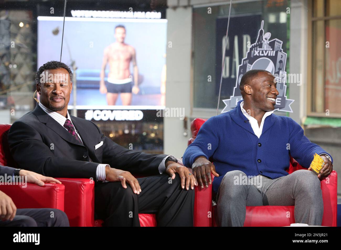 Football legend Shannon Sharpe, right, tells fans why Butterfinger