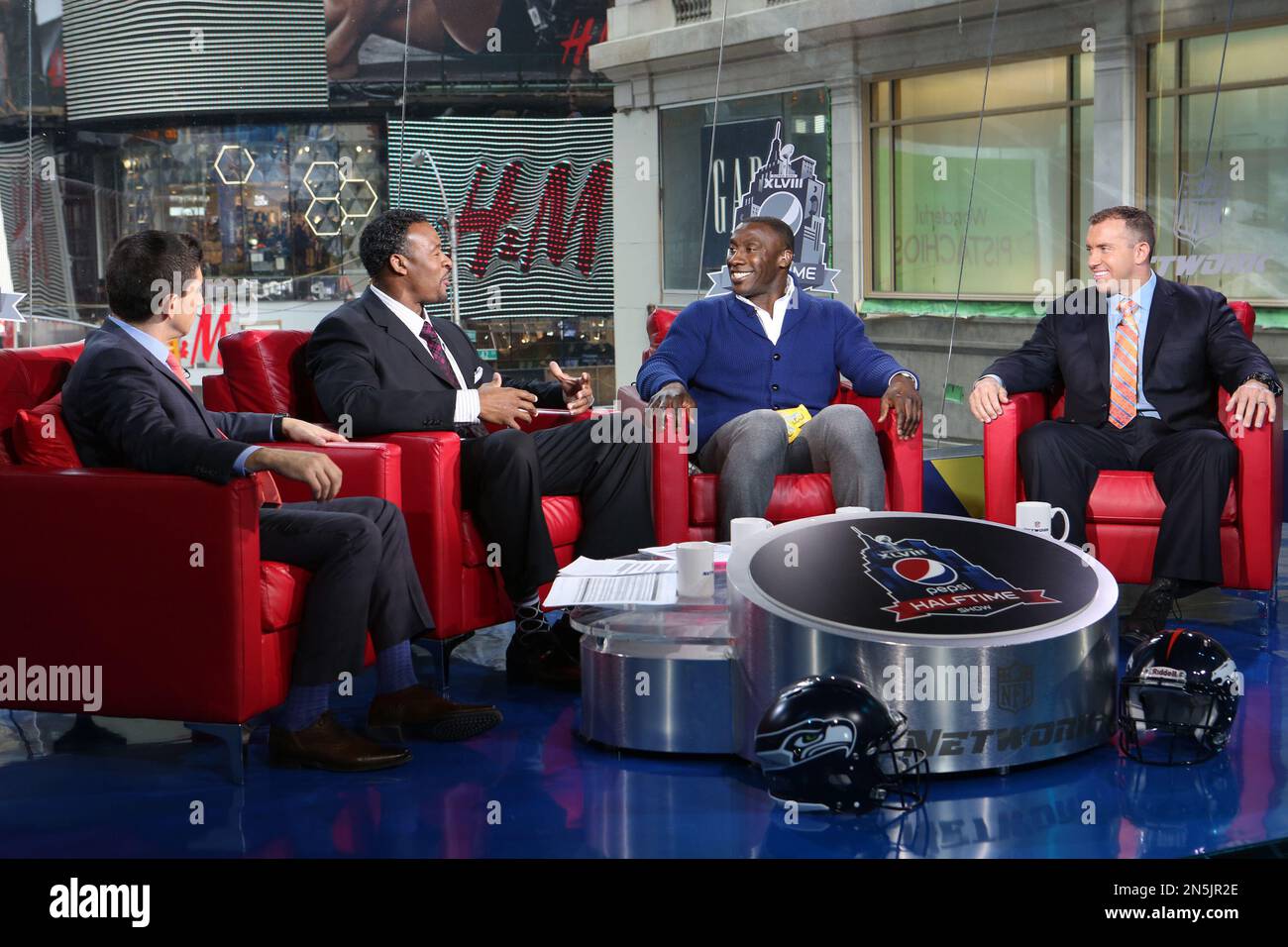 Football legend Shannon Sharpe, third from left, tells fans why