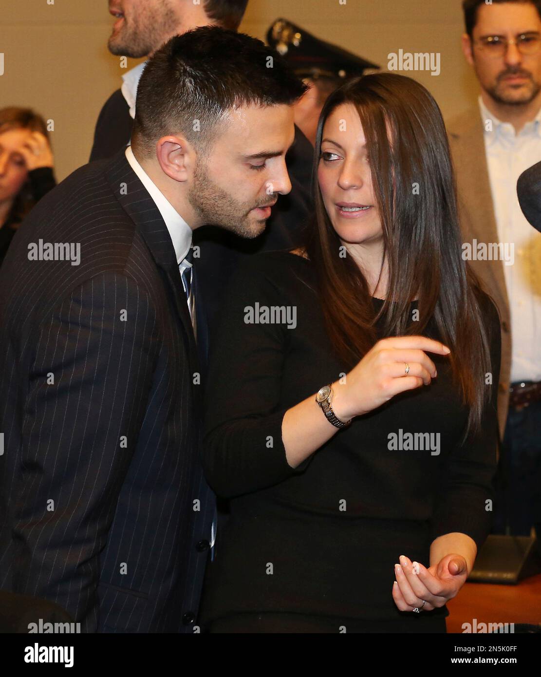 Meredith Kercher's brother Lyle, left, and sister Stephanie talk after