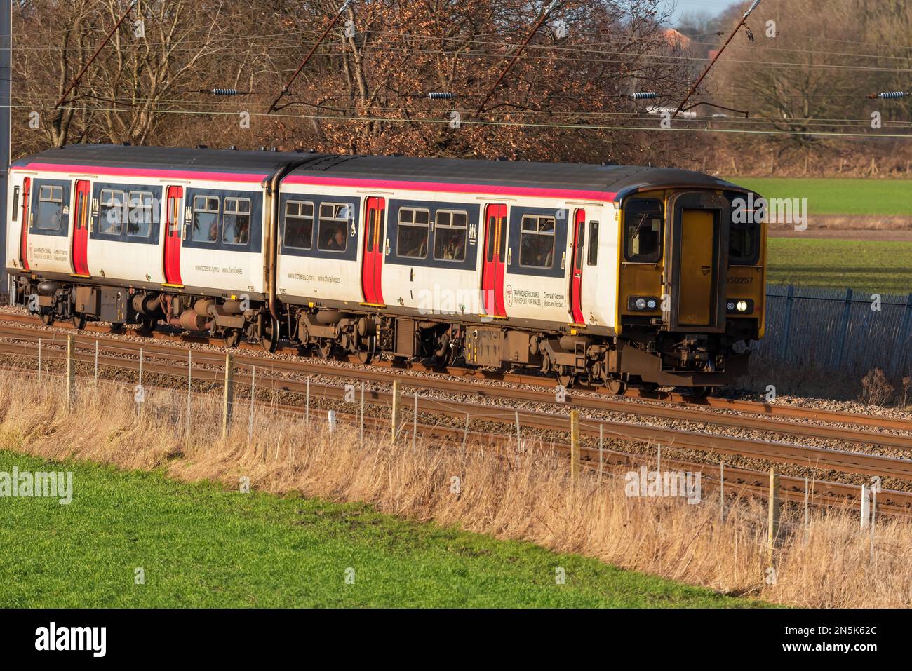 Transport for Wales Class 150 diesel DMU train on West Coast main line at Winwick. Stock Photo