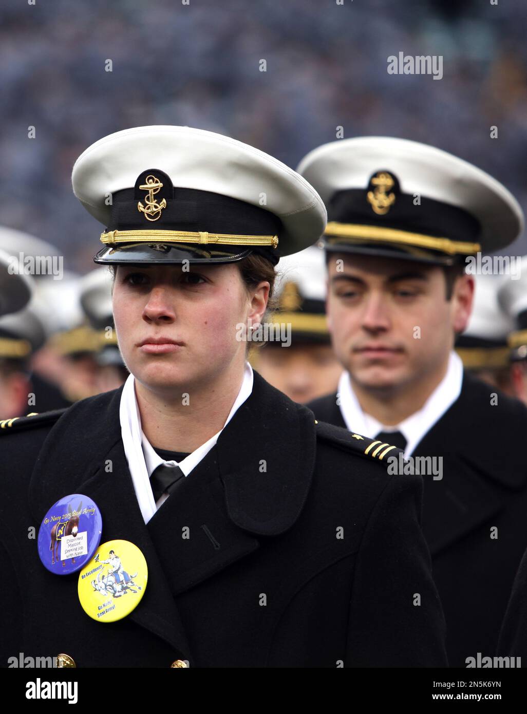 Navy women's soccer goalkeeper Elizabeth Hoerner, left, stands in