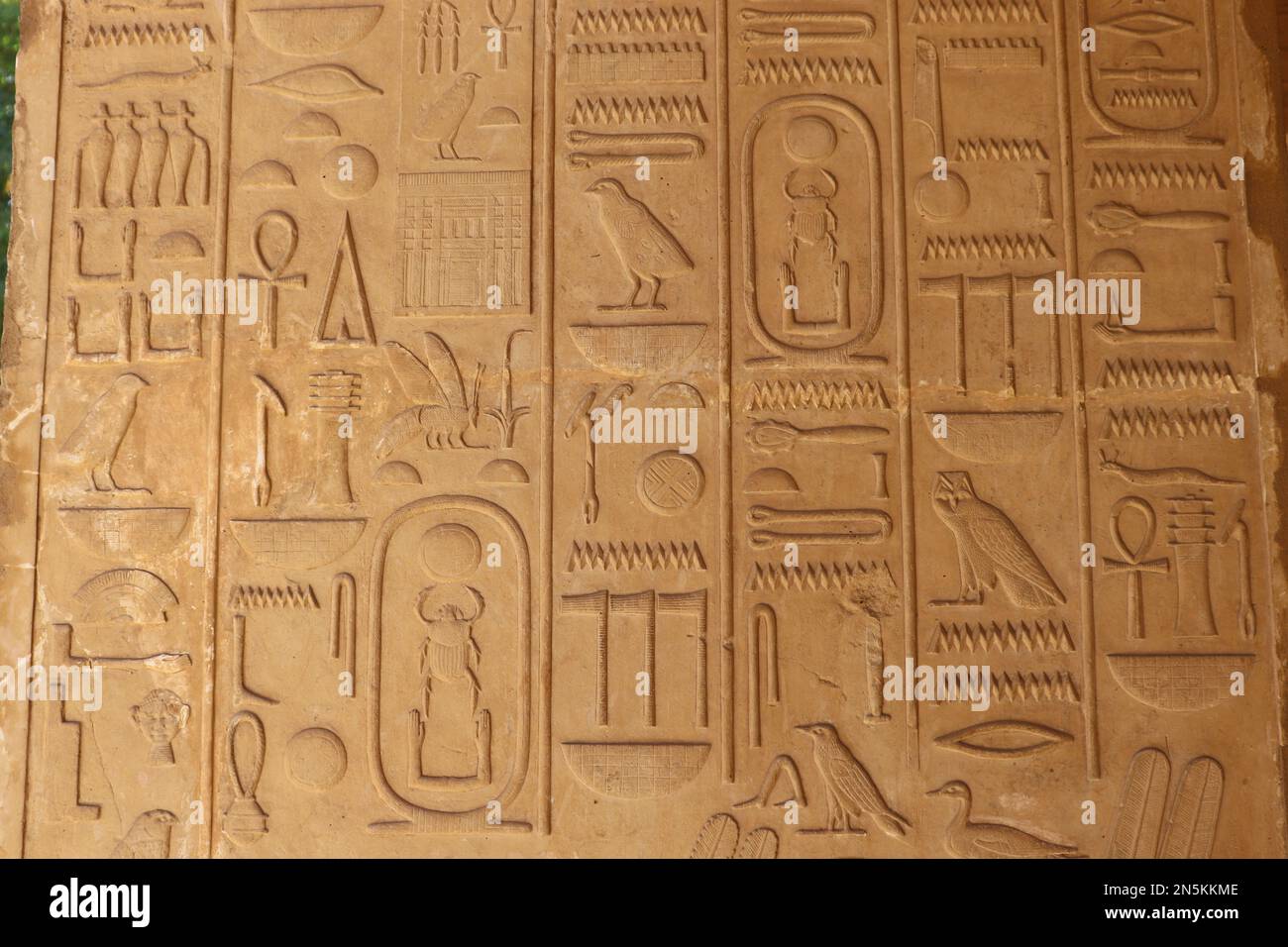 ancient egyptian symbols and hieroglyphs carved at Karnak temple in Luxor, Egypt Stock Photo