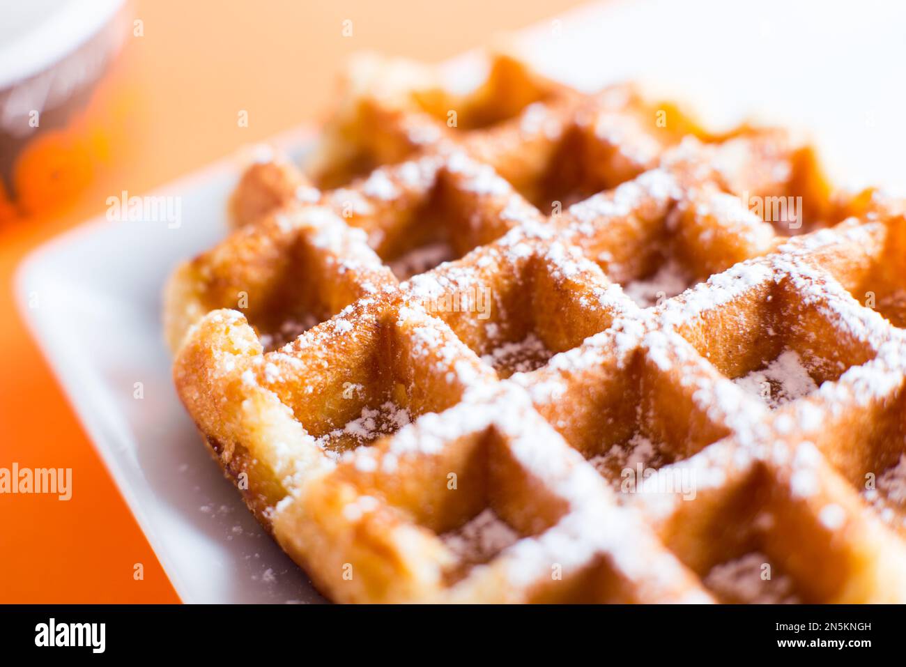 A waffle, also cited with the foreign words waffle, wafol, wafel or waffle, is a typical Belgian and northern French breakfast. Stock Photo